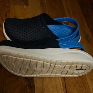 Crocs. Are very compfortable. And can be used as slides or running shoes.